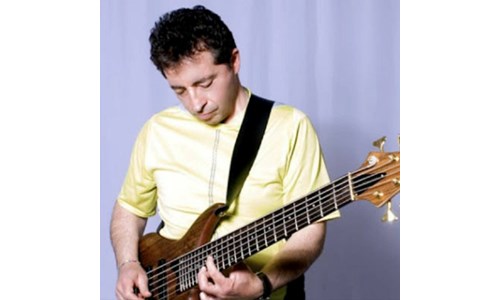 MELİK YİRMİBİR  (BAS GİTAR)